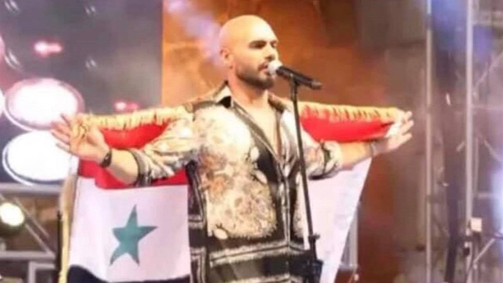 رفع جوزيف عطية العلم السوري يثير الجدل