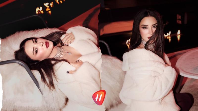 ماغي بو غصن تحتضن الشتاء بفرو أبيض ومجوهرات ماسية فخمة