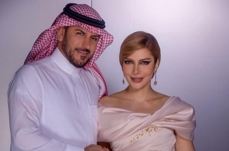 فائق حسن يفاجئ أصالة نصري بلوك جديد في باريس.. شعره الأشقر يثير الجدل