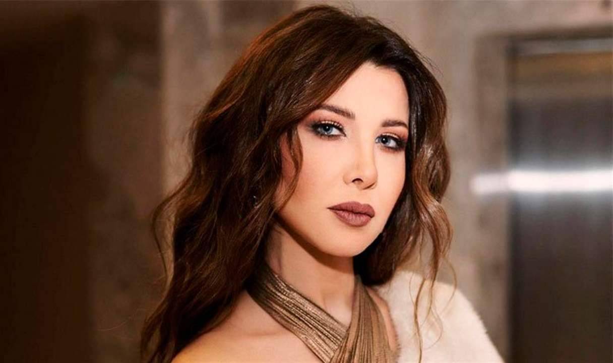 ماذا قصدت نانسي عجرم بصورة خريطة لبنان؟